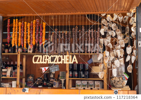 Churchkhela hangs in clusters in the food market close-up. Traditional Georgian national delicacy. 117218364