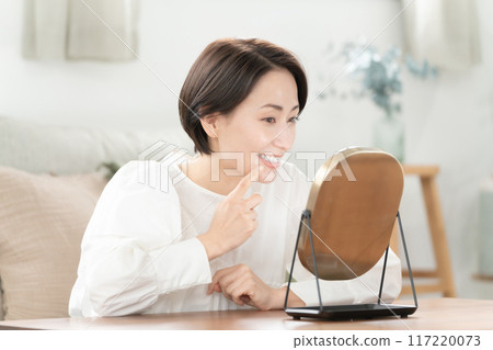 Dental teeth middle-aged woman Dental teeth middle-aged woman 117220073