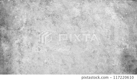 A rough concrete wall with scratches and spots of monochrome color 117220610