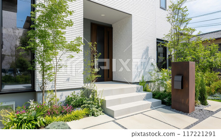 具有白色外觀和種植的現代房屋的形象 具有白色外觀和種植的現代房屋的形象 117221291