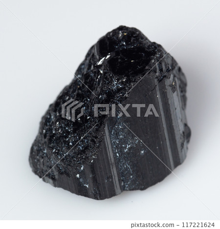 natural black tourmaline scherl on the white background 117221624