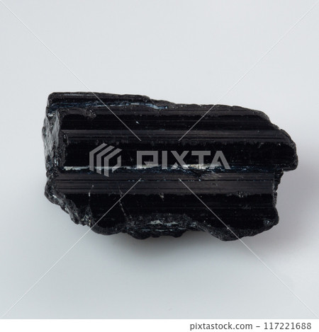 natural black tourmaline scherl on the white background 117221688