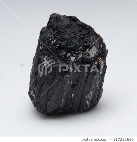 natural black tourmaline scherl on the white background 117221696