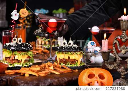 Witch's cocktail with eyeballs in a martini glass Witch's cocktail with eyeballs in a martini glass 117221988