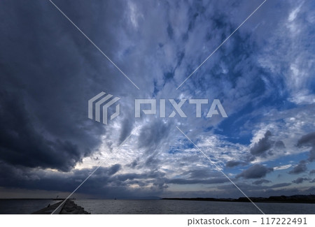 Evening sky with various clouds spreading across the sky and the harbor, ultra-wide angle, sky-focused, 231220pm 117222491