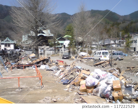 Tsunami-washed rubbish scattered across the land 117222529