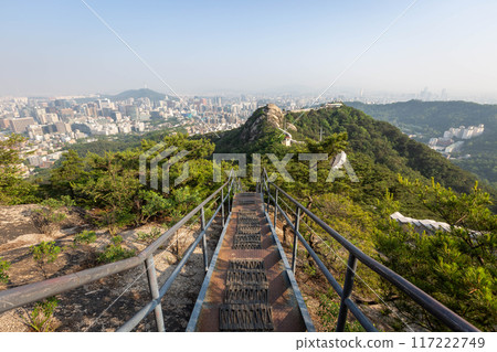 Seoul cityscape in the afternoon and Dongdaemun skyscrapers with Namsan Mountain in the background, Seoul, South Korea Seoul cityscape in the afternoon and Dongdaemun skyscrapers with Namsan Mountain in the background, Seoul, South Korea 117222749