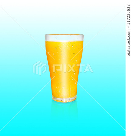 A glass of orange juice contains orange pulp. with the reflection of a glass of orange juice on a blue background A glass of orange juice contains orange pulp. with the reflection of a glass of orange juice on a blue background 117223638