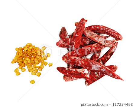 dried chilli and expanded seeds isolated on white background dried chilli and expanded seeds isolated on white background 117224498