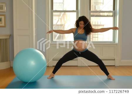 Harmony Within: Expectant Mother Embracing Yoga Practice Harmony Within: Expectant Mother Embracing Yoga Practice 117226749