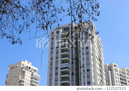 Architectural details of tall buildings and structures close-up. 117227515