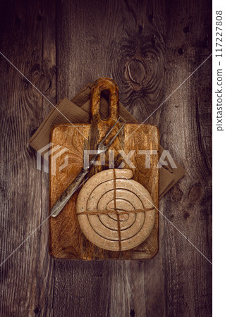 raw spiral sausages, on a wooden board, top view, no people, raw spiral sausages, on a wooden board, top view, no people, 117227808