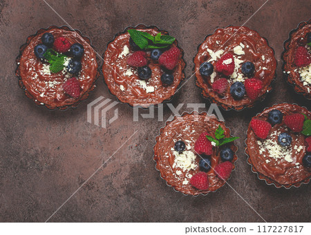 chocolate tartlets, stuffed with cottage cheese and berries, breakfast, homemade, no people, 117227817