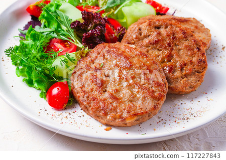 Fried cutlets, turkey, with vegetable salad, top view, no people, Fried cutlets, turkey, with vegetable salad, top view, no people, 117227843