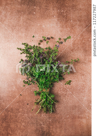 bouquet of herb ombalo, marsh mint, bunch of mint, top view, on a brown background, spice, Georgian cuisine, bouquet of herb ombalo, marsh mint, bunch of mint, top view, on a brown background, spice, Georgian cuisine, 117227987