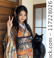 Portrait of a young Japanese woman in a kimono and a black cat 117228026