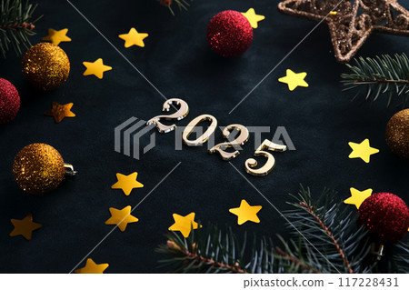 New Year 2025 background. Number of the coming year in Christmas decoration. 117228431