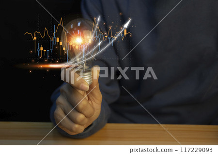 Planning & Strategy Stock Market Business Growth progress or success Businessman or trader hand touches showing virtual hologram stock invest in trading. 117229093