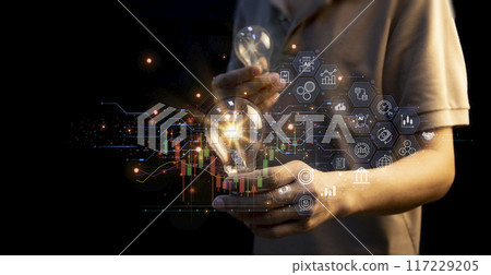 Business hand holding light bulb with business startup icon fast to the goal and achieve goal and solution concept. 117229205