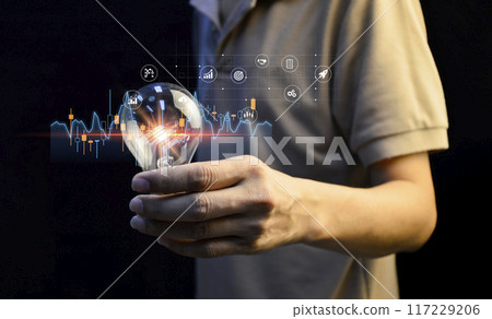 Business hand holding light bulb with business startup icon fast to the goal and achieve goal and solution concept. 117229206