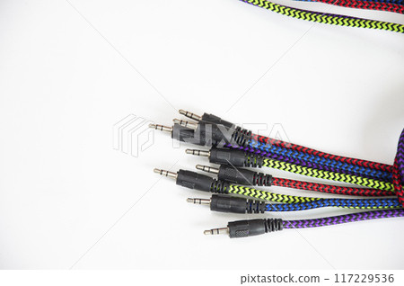AUX audio cable on a white background 117229536
