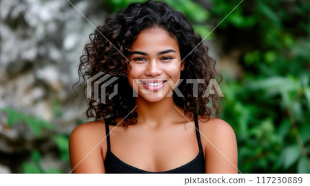 Golden Hour Delight: Smiling Black Woman by the Seashore 117230889