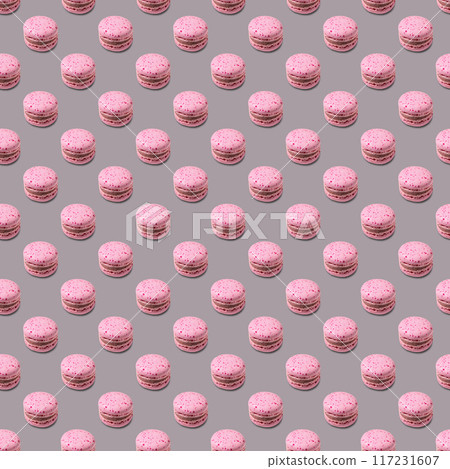 Seamless pattern with french pink macaroon on a gray background. Seamless pattern with french pink macaroon on a gray background. 117231607