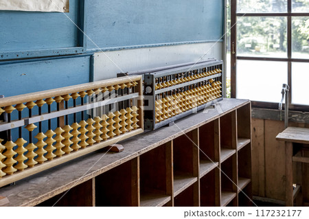 A retro professor's abacus bathed in soft outdoor light [Five balls] 117232177