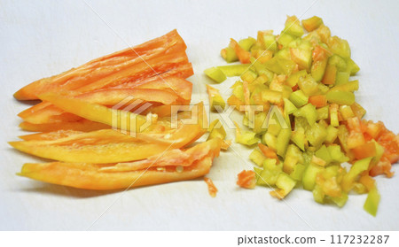 sweet bell pepper on the kitchen board. cutting ingredients for cooking sweet bell pepper on the kitchen board. cutting ingredients for cooking 117232287