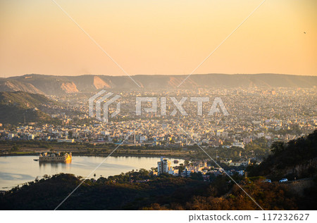 View of Man Sagar Lake, Jal Mahal, and the Jaipur City from the 17th century Jaigarh Fort at Jaipur, Rajasthan, India 117232627