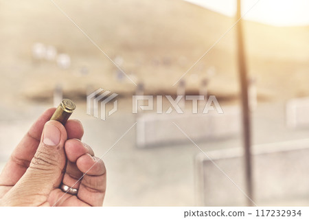 The power of a life in your fingers, holding a 9mm bullet. The power of a life in your fingers, holding a 9mm bullet. 117232934