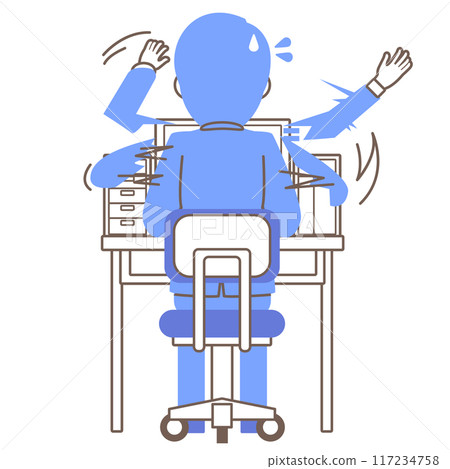 Rear view of a male employee busy with clerical work on a computer 117234758
