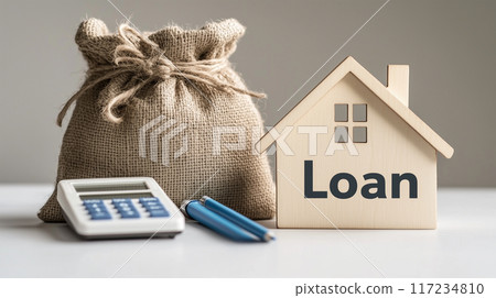 Loan bag with a wooden house model and a calculator 117234810
