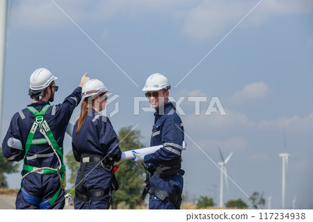 Team engineer wind turbine worker safety uniform 117234938