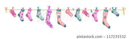 Clothesline socks. Socks on a rope, Baby socks with patterns vector cartoon. Clothesline socks. Socks on a rope, Baby socks with patterns vector cartoon. 117235532