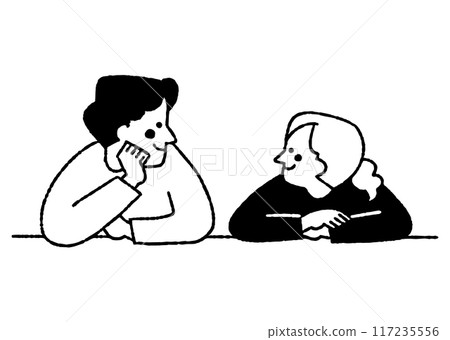 Two people looking at each other with their elbows on the table_2 117235556