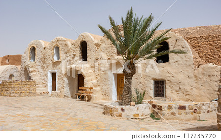 Ghorfa storage graneries of traditional Berber mud brick fortified Ksar of Hedada or Hadada, near Tetouin, Tunisia 117235770