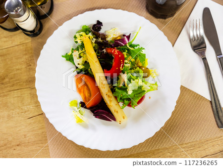 Crisp and refreshing colorful vegetable salad, perfect for dinner Crisp and refreshing colorful vegetable salad, perfect for dinner 117236265