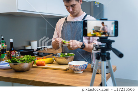 The chef is broadcasting live from workshop how to prepare a spicy glass noodle salad The chef is broadcasting live from workshop how to prepare a spicy glass noodle salad 117236506
