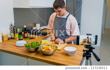 The chef is broadcasting live from workshop how to prepare a spicy glass noodle salad The chef is broadcasting live from workshop how to prepare a spicy glass noodle salad 117236511
