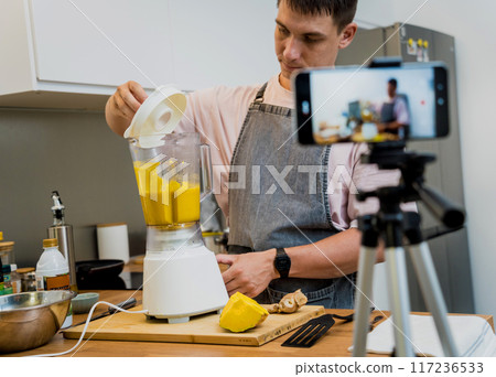 The chef is broadcasting live from workshop how to prepare a vegetarian food 117236533