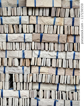 Brick stack tied with ropes for construction and building purposes 117236550