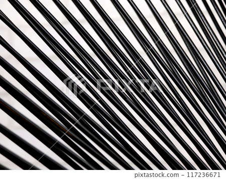 Closeup of black wires shapes and patterns materials Closeup of black wires shapes and patterns materials 117236671