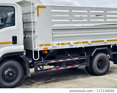 Truck are parked beside each other in a parking area Truck are parked beside each other in a parking area 117236688