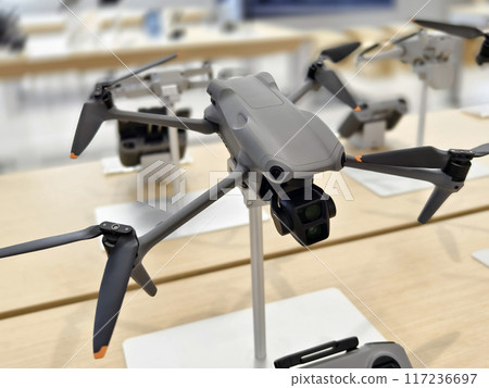 Modern drone for video and photo in the light store Modern drone for video and photo in the light store 117236697