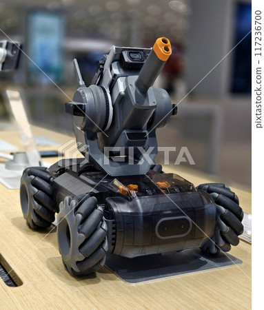 Modern military drone on table in the light store Modern military drone on table in the light store 117236700
