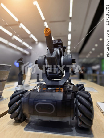 Modern military drone on table in the light store Modern military drone on table in the light store 117236701