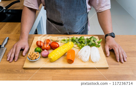 Cutting board with ingredients for preparing spicy glass noodle salad Cutting board with ingredients for preparing spicy glass noodle salad 117236714