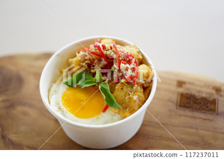 A bowl of food with meat and eggs A bowl of food with meat and eggs 117237011