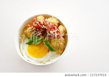A bowl of food with meat and eggs A bowl of food with meat and eggs 117237014
